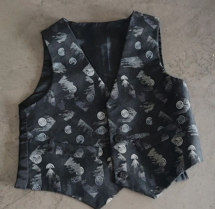 Gilet sans manche avec boutons 4 ans