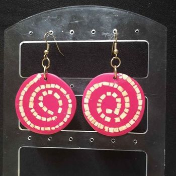 Boucles d'oreilles ronde rose avec spirale