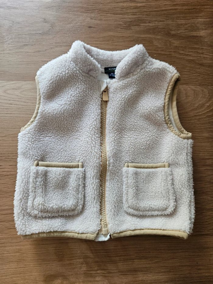 Veste sans manches 9 mois