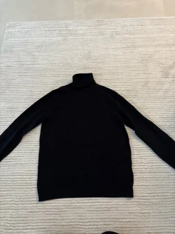 Pull col roulé