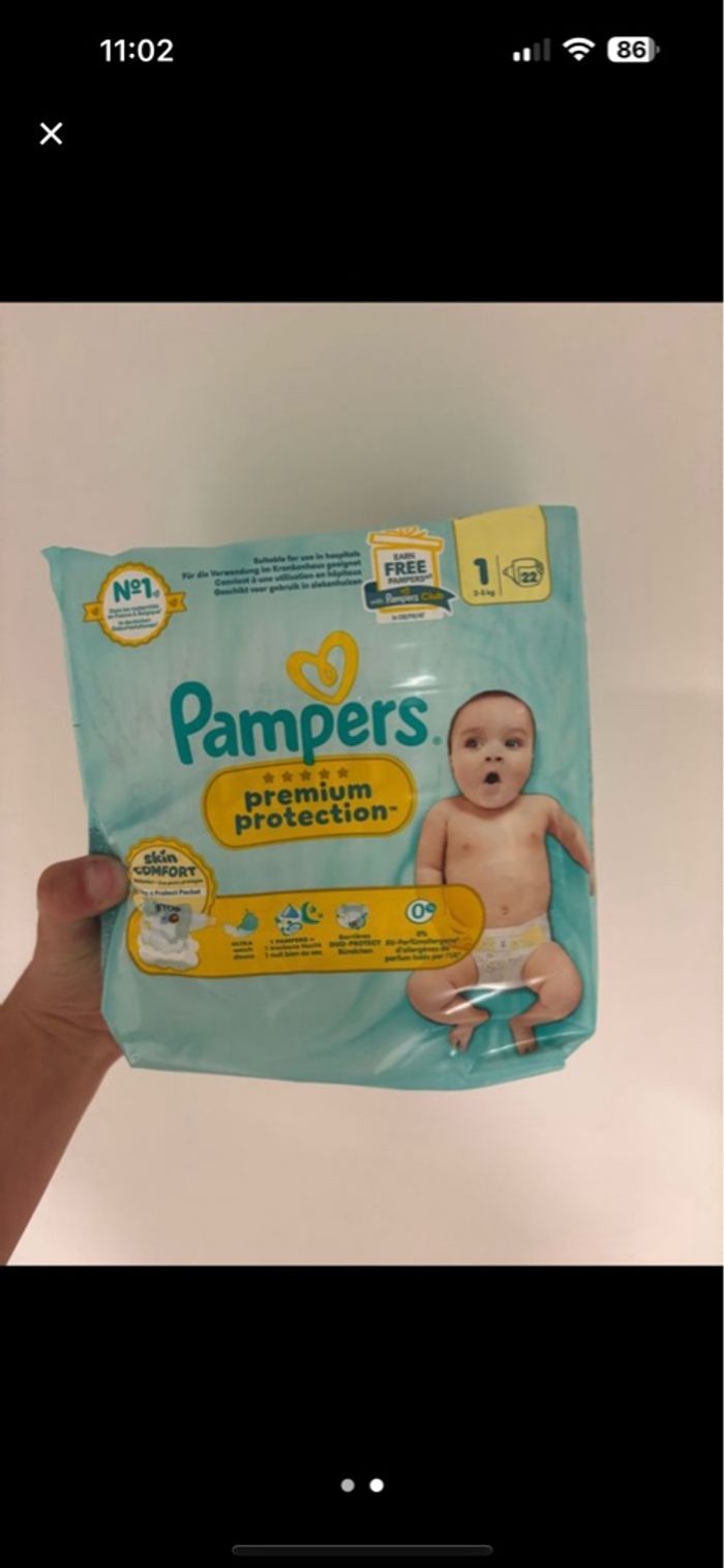 4 paquets de couches taille 1