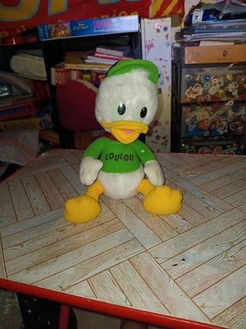 Peluche vintage loulou duck a une tache sur le bras