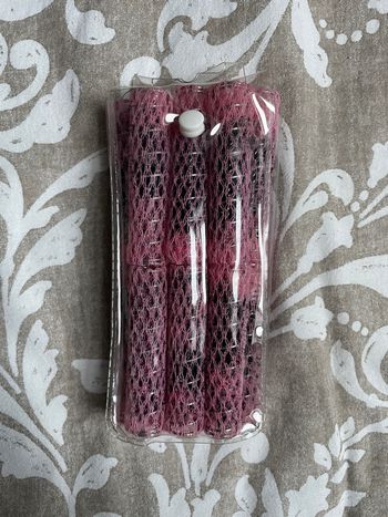 16 bigoudis rose auto-aggrippant