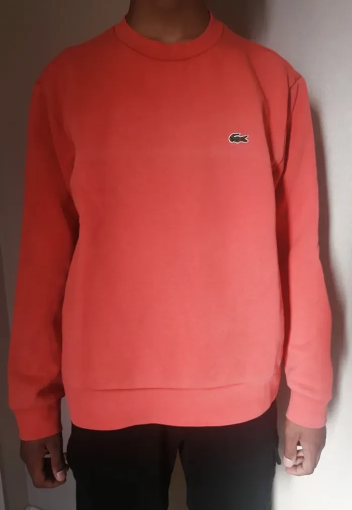 Pull Lacoste coloris pêche taille 5 L