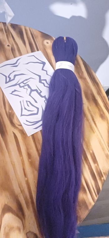 Tresse K-pop et tatouage rumi
