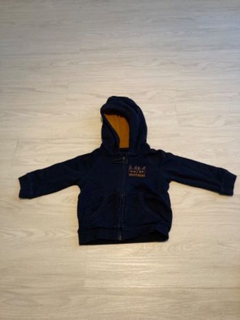 Gilet zip à capuche
