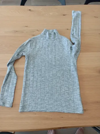 Pull col montant