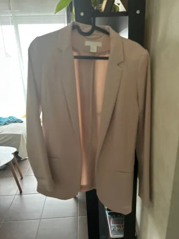 Veste rose poudré