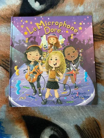 Livre Le Microphone Doré