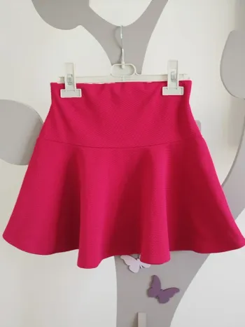 Jupe patineuse fuschia Kiabi taille 8 ans