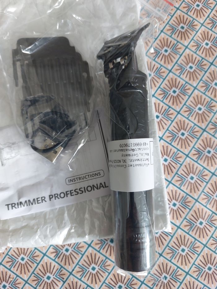 Tondeuse à cheveux noir motif bouhda - photo numéro 5