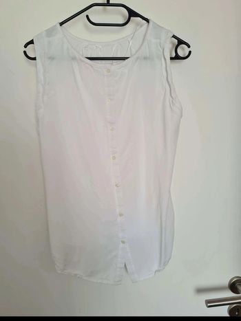 Haut blanc chemise inversé boutonné transparent taille 40