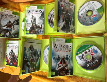 Lot complète de 6 épisodes de jeux XBox 360 Assassin's Creed avec notices