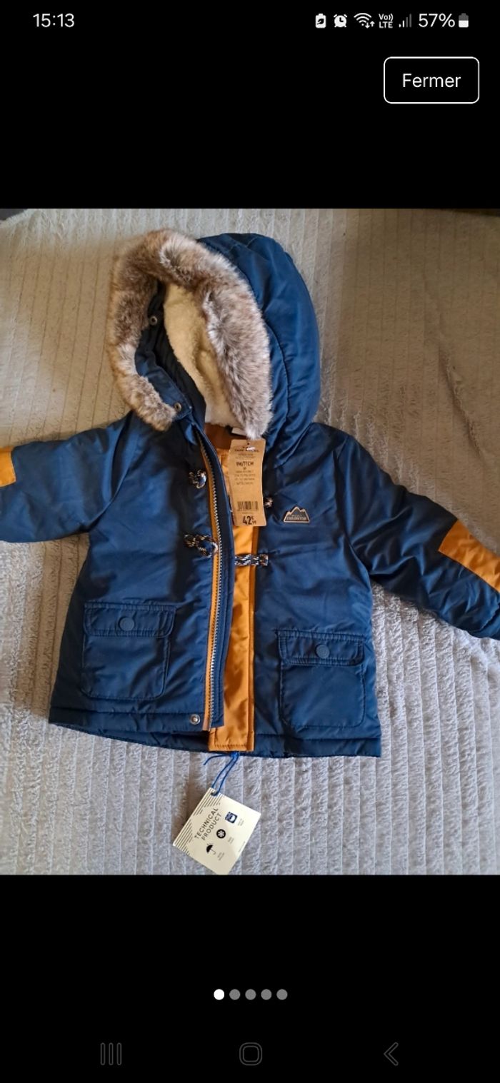 Manteau neuf 9mois