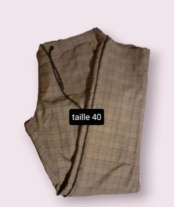 Superbe pantalon NPO. Taille M. Très bon état.