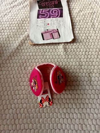 Cache oreilles Minnie