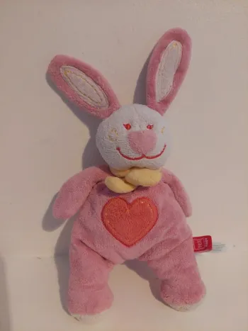 Tex - petite peluche lapin rose coeur sur le ventre