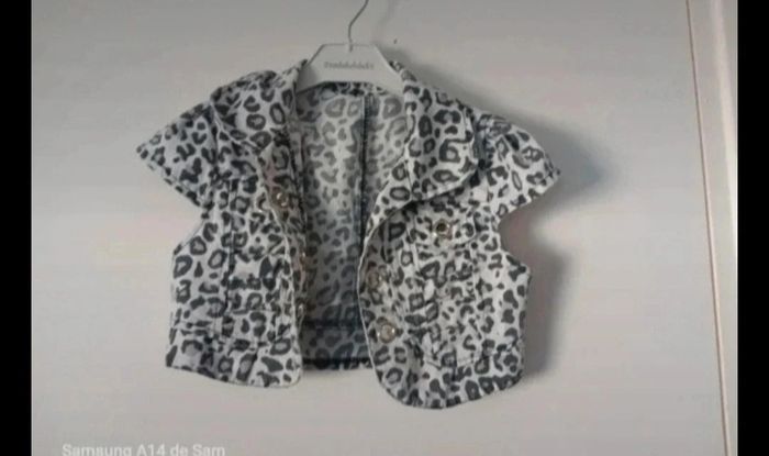 Veste lepoard 8 ans