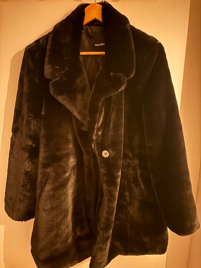 Manteau fausse fourrure