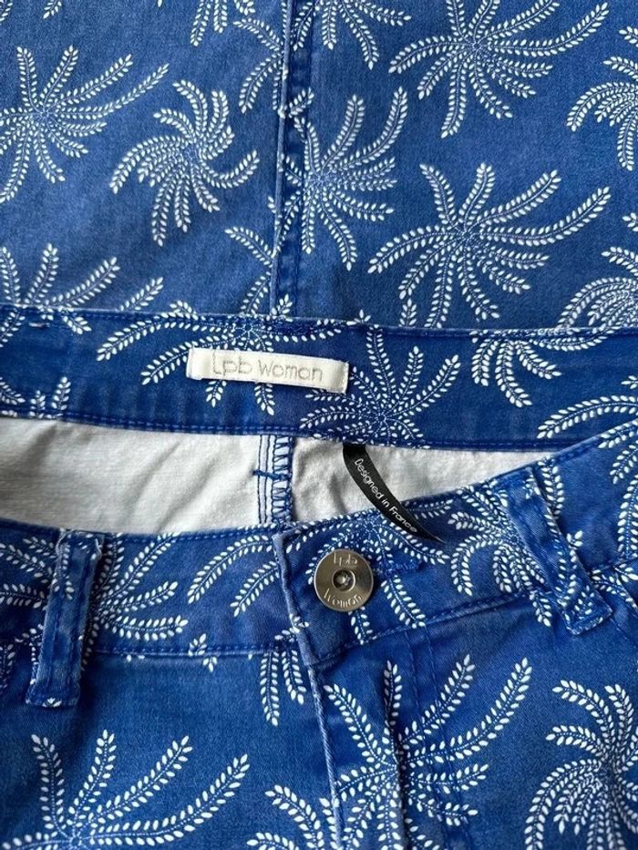 Jupe en jean bleu avec imprimé feuilles blanches style palmiers taille 40 - Les Petites Bombes Paris - photo numéro 4