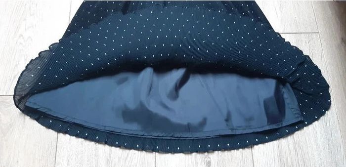 Jupe doublée orchestra noire 10 ans état neuve - photo numéro 2