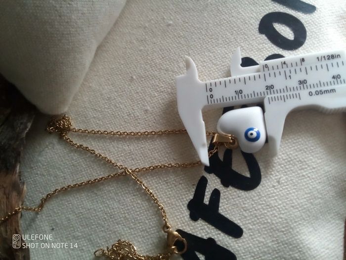 Collier coeur blanc émaillé avec oeil du turc du nazar 🧿. - photo numéro 2