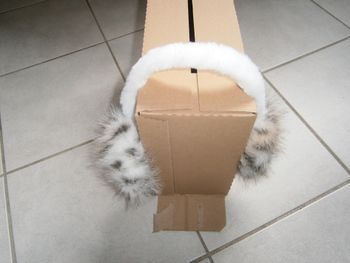 Cache oreilles en peluche léopard