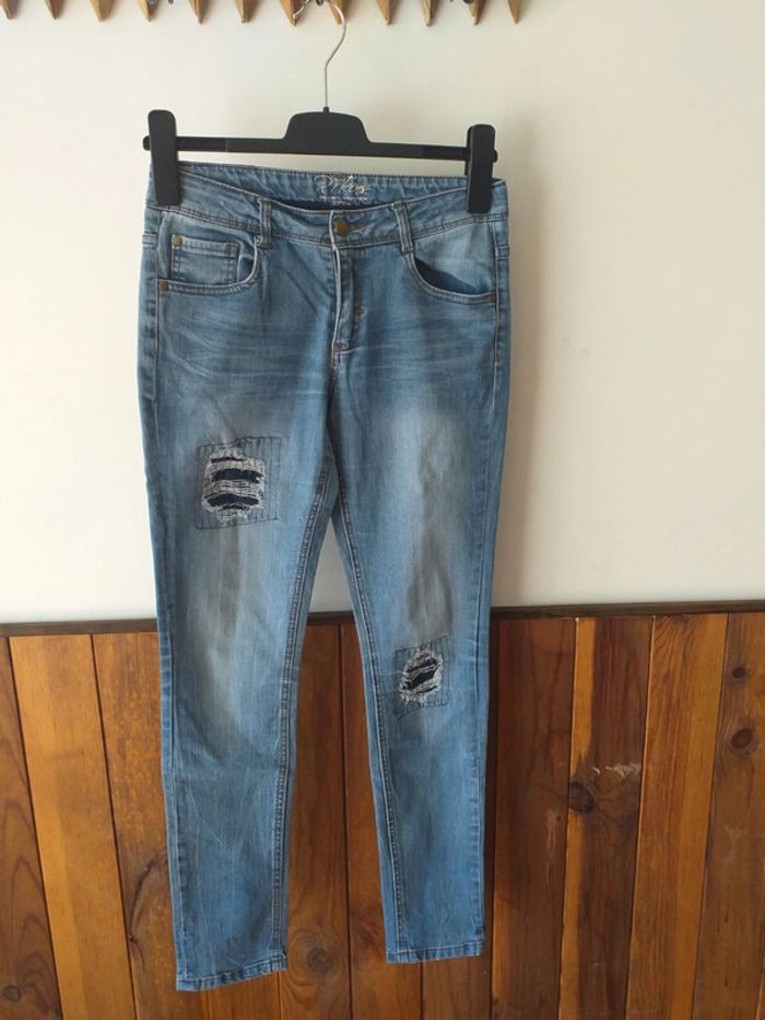 Jeans bleu effet troué