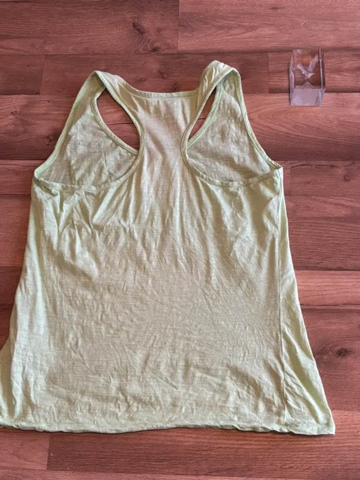 Je vend un débardeur femme taille T3 L très bon état - photo numéro 2