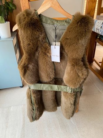 Manteau sans manches neuf