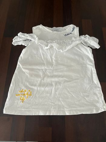 Petit haut fille taille 5 ans en parfait état 95% coton