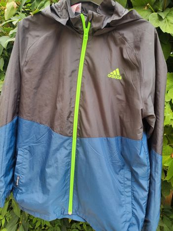 Imperméable avec capuche amovible