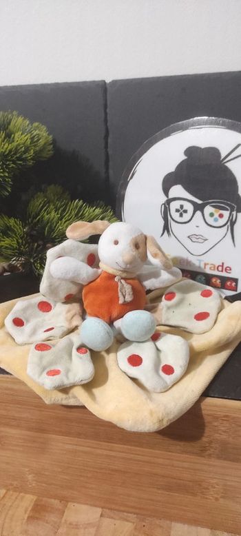 Doudou et Compagnie Chien rond plat jaune vert orange fleur petale pois