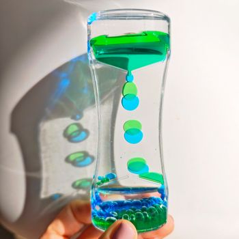 Sablier sensoriel liquide