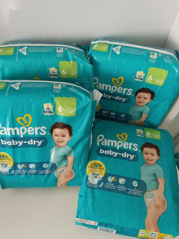 4 paquets Pampers taille 6