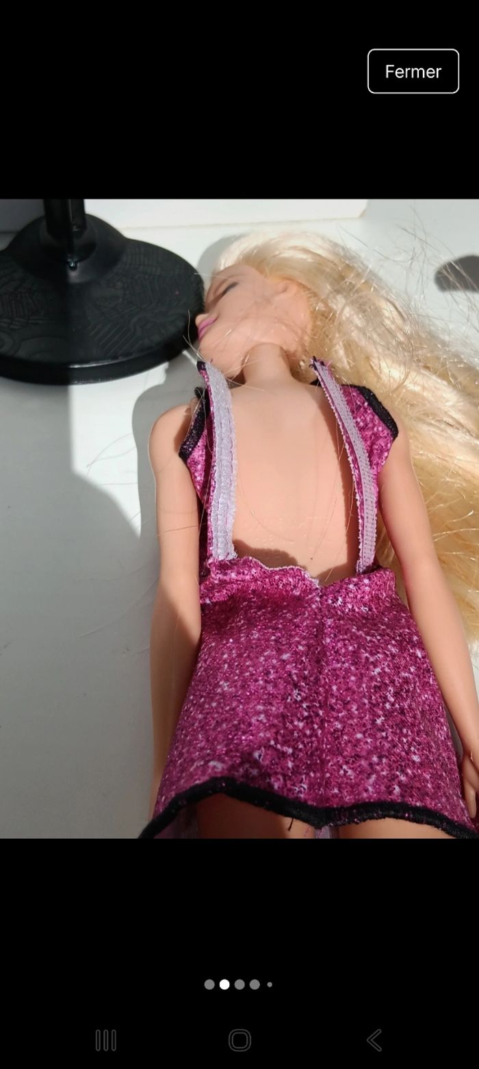 Poupée barbie mattel ensemble rose a paillettes tête 2013 corp 2015 
Poupée et ensemble compris - photo numéro 6