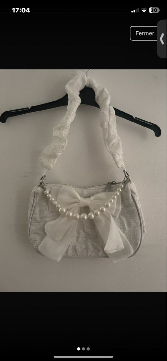 Sac à main blanc nord papillon et perle neuf