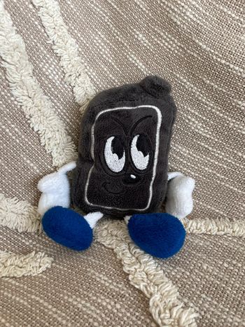 Peluche doudou 18cm Roche bonhomme carré noir gris et bleu très bon état