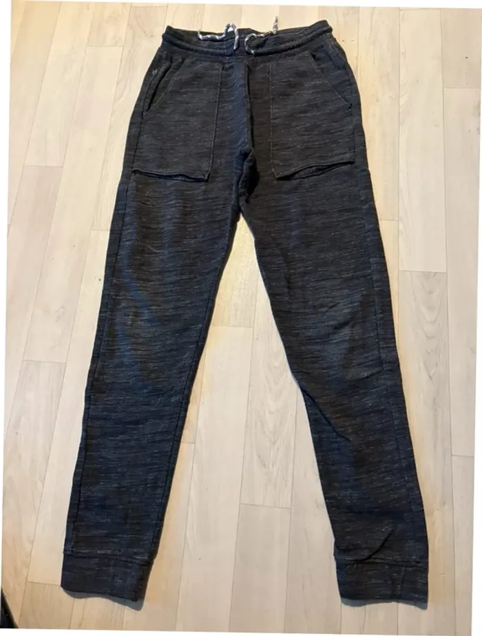 Jogging Kiabi gris moucheté 12 ans très bon état