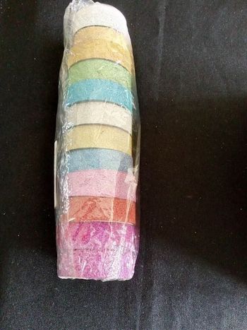 LOT de  12 rouleau adhésif   pailleté , il en manque très peu sur un seul rouleau