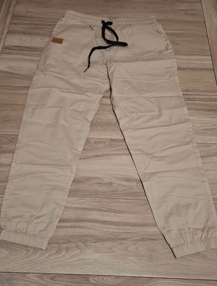 Pantalon cargo homme jogging survêtement décontracté élastique avec poches coupe classique beige
