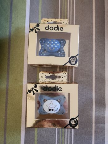 2 sucettes dodie dorées neuves 