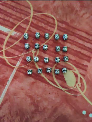 Lot de 20 perles argentées motif coeur