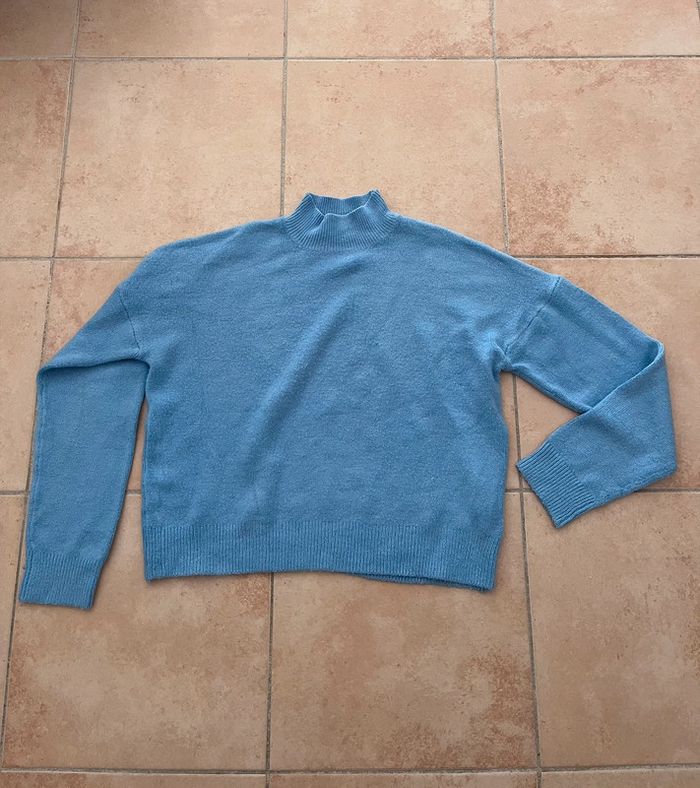 Pull col roulé bleu