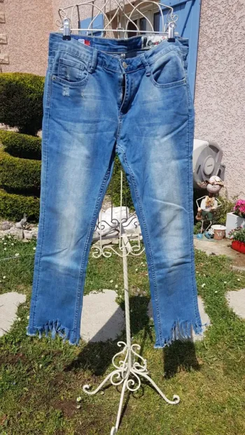 Jean droit frangé