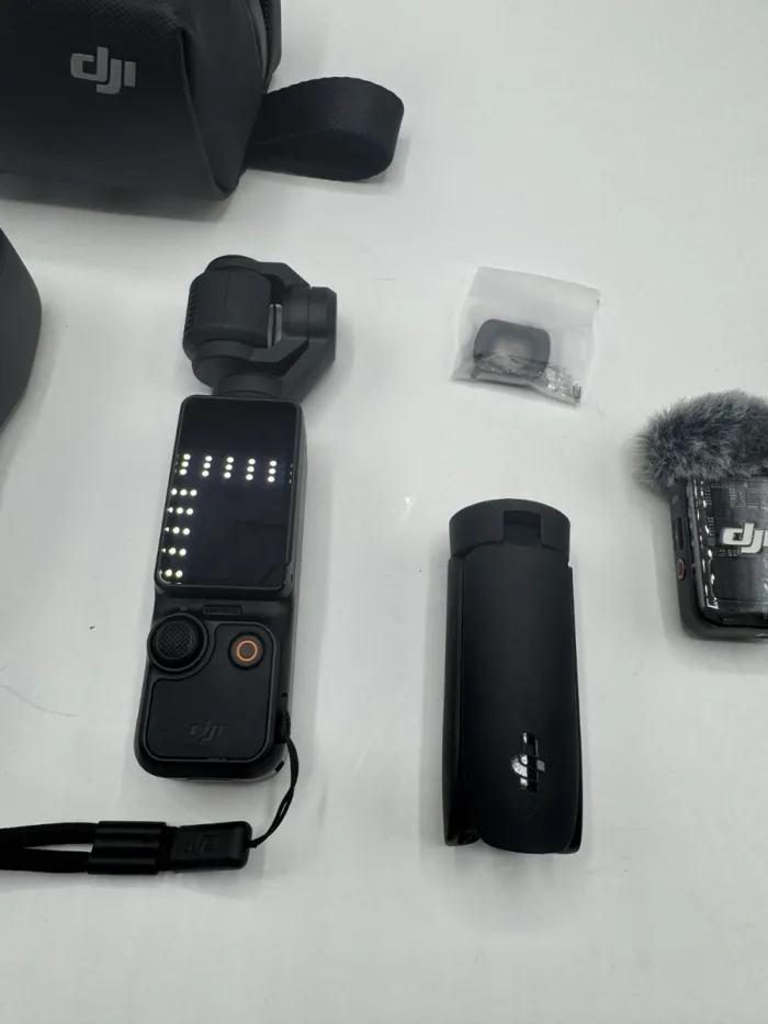 DJI Osmo Pocket Stabilisateur 3 Axes et Caméra Portable 4K Créateur Combo en parfait état - photo numéro 2
