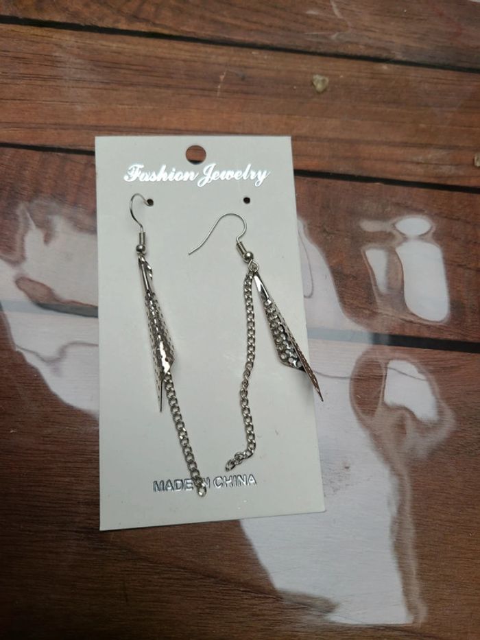 Boucles d'oreilles à trous - photo numéro 2