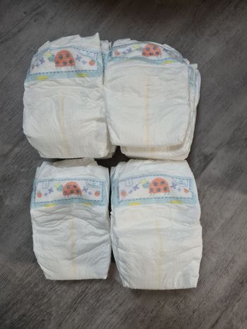 Couches pampers premium protection