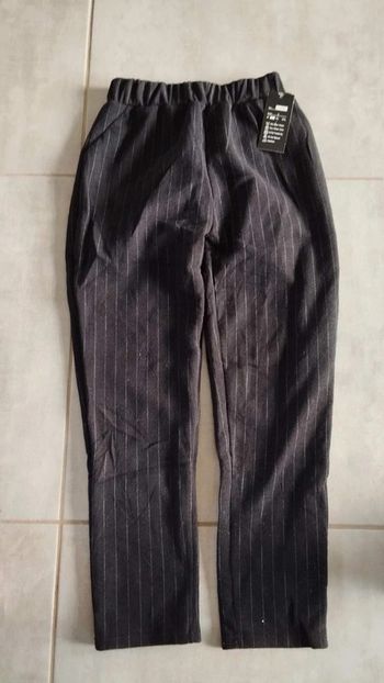 Pantalon noir épais  taille l rayé