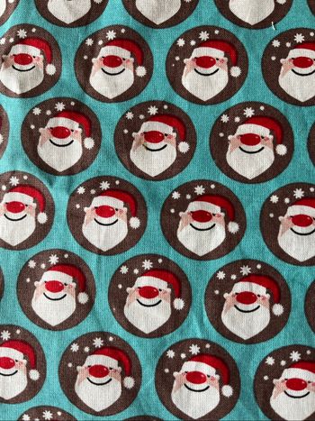 Chute de tissus imprimés Père Noël